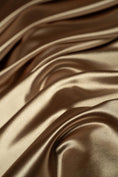 Load image into Gallery viewer, Taupe Shiny Nylon Spandex | Stretchy Fabric by the Yard | Ideal for Sportswear, Bridal Attire, Evening & Prom Dresses, Costumes and More.
