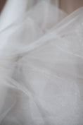 Load image into Gallery viewer, Ivory Shiny Mesh Fabric by the Yard | Ivory Fabric for Wedding Dresses & Festivals | Perfect for Every Occasion.