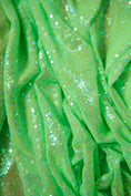 Load image into Gallery viewer, Mint Green Sequin Fabric by the Yard | Iridescent Sequins for Luxury Fashion and Festival Wear | Shiny Fabric for Special Occasions.