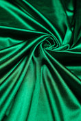 Load image into Gallery viewer, Luxurious Gucci Green Shiny Nylon Spandex Fabric  Stretchy Fabric Perfect for Bridal Gowns, Evening Dresses, Sportswear  Sold by the Yard
