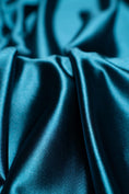 Load image into Gallery viewer, Premium Teal Shiny Nylon Spandex by the Yard Stretchy Material for Wedding, Bridal Attire, Evening Dresses, Prom Dresses, Costumes and More.
