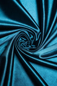 Load image into Gallery viewer, Premium Teal Shiny Nylon Spandex by the Yard Stretchy Material for Wedding, Bridal Attire, Evening Dresses, Prom Dresses, Costumes and More.
