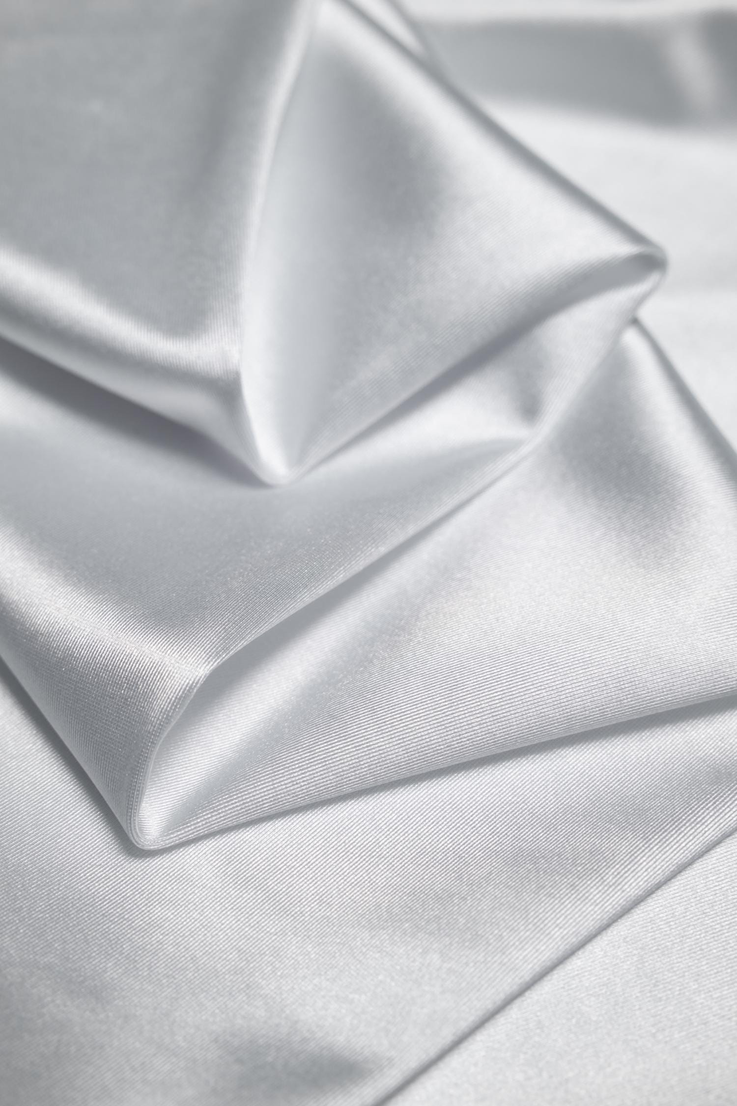 Premium White Shiny Nylon Spandex by the Yard | Stretchy Material for Dynamic Designs, Bridal Attire & Evening Gowns