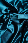 Load image into Gallery viewer, Premium Teal Shiny Nylon Spandex by the Yard Stretchy Material for Wedding, Bridal Attire, Evening Dresses, Prom Dresses, Costumes and More.
