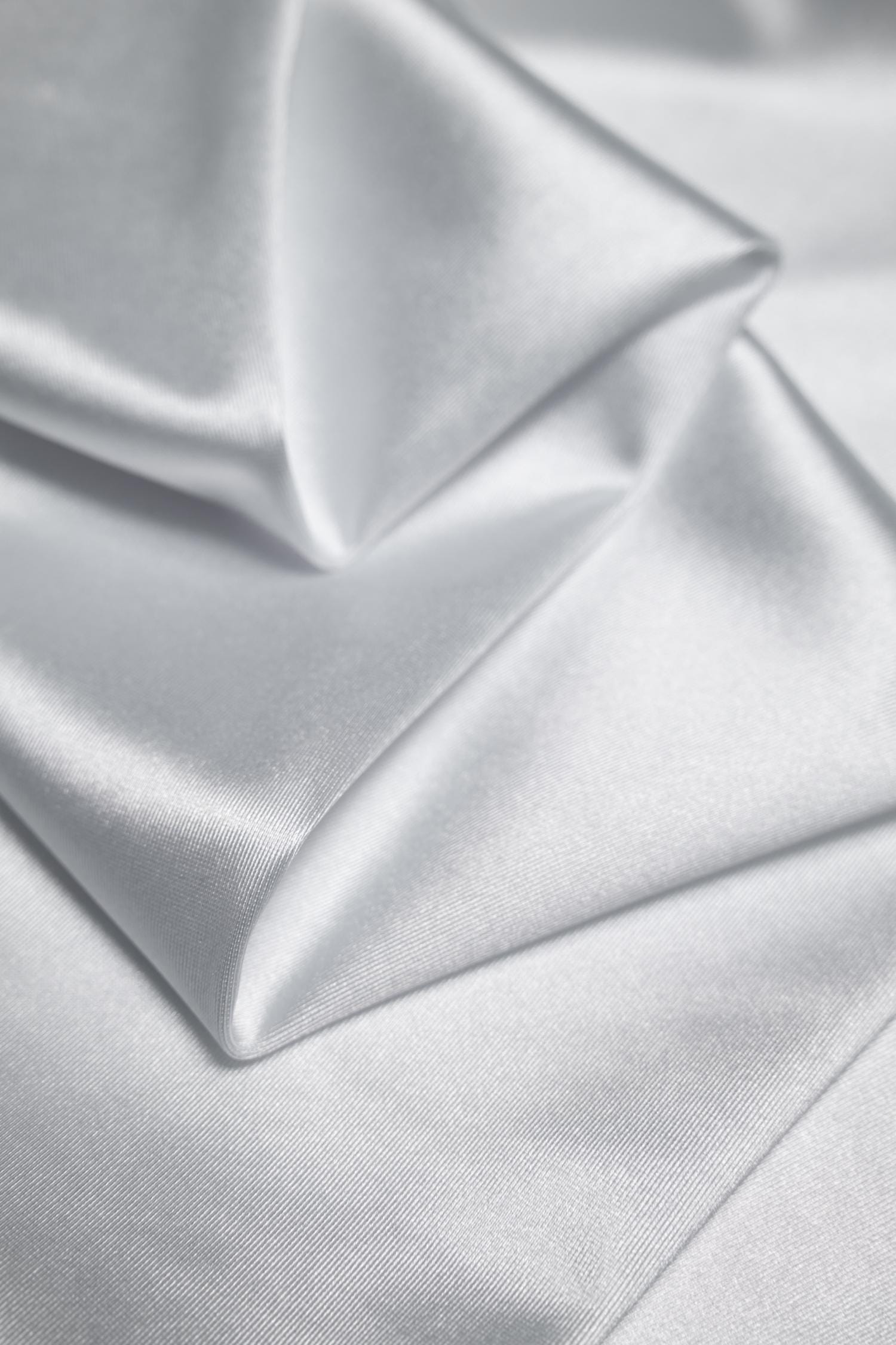 Premium White Shiny Nylon Spandex by the Yard | Stretchy Material for Dynamic Designs, Bridal Attire & Evening Gowns