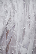 Load image into Gallery viewer, Top-Rated Milky White Pearl Fabric: Elegant Wedding Fabric by the Yard for Bridal Attire, Festival Designs & Unique Creations.
