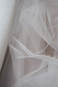 Load image into Gallery viewer, Ivory Shiny Mesh Fabric by the Yard | Ivory Fabric for Wedding Dresses & Festivals | Perfect for Every Occasion.
